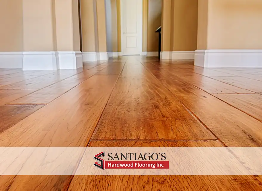 Warped hardwood floorboards caused by moisture problems